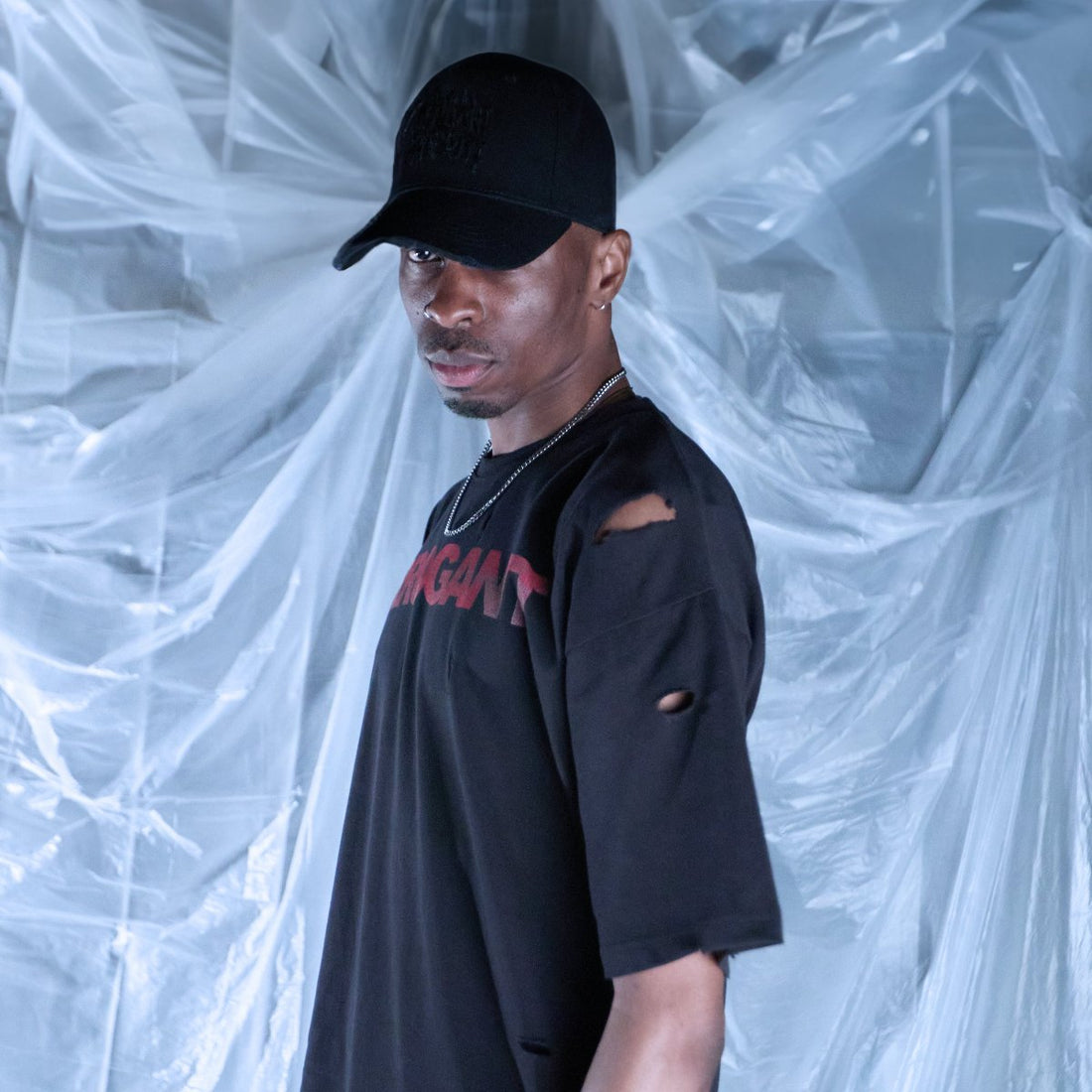 DISTRESSED 'ARROGANT' OVERSIZED  TEE