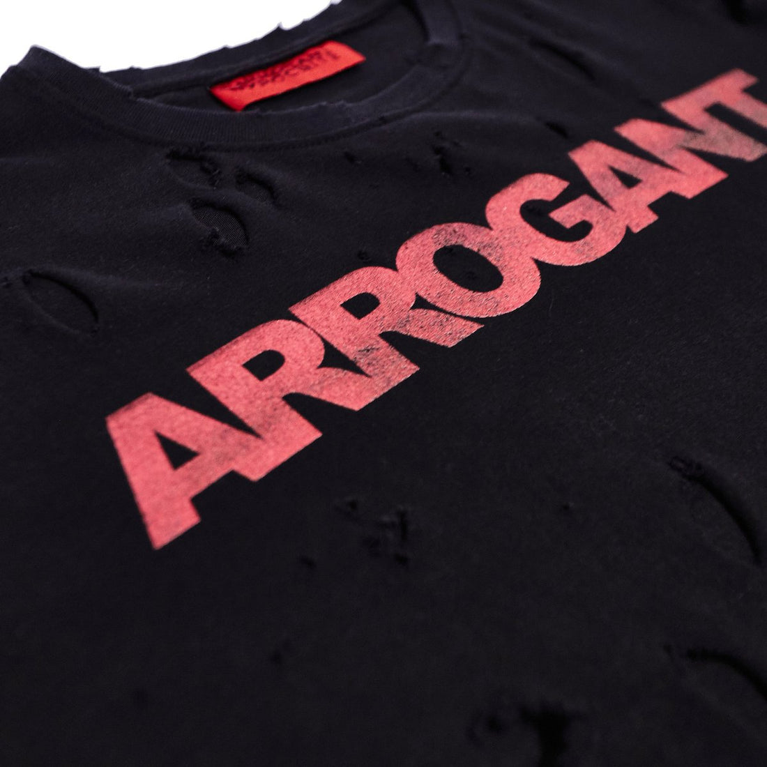 DISTRESSED 'ARROGANT' OVERSIZED  TEE